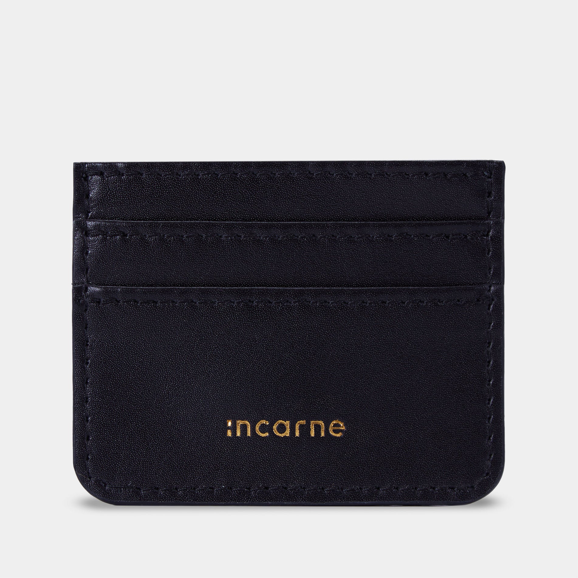 Minimal black leather cardholder front view