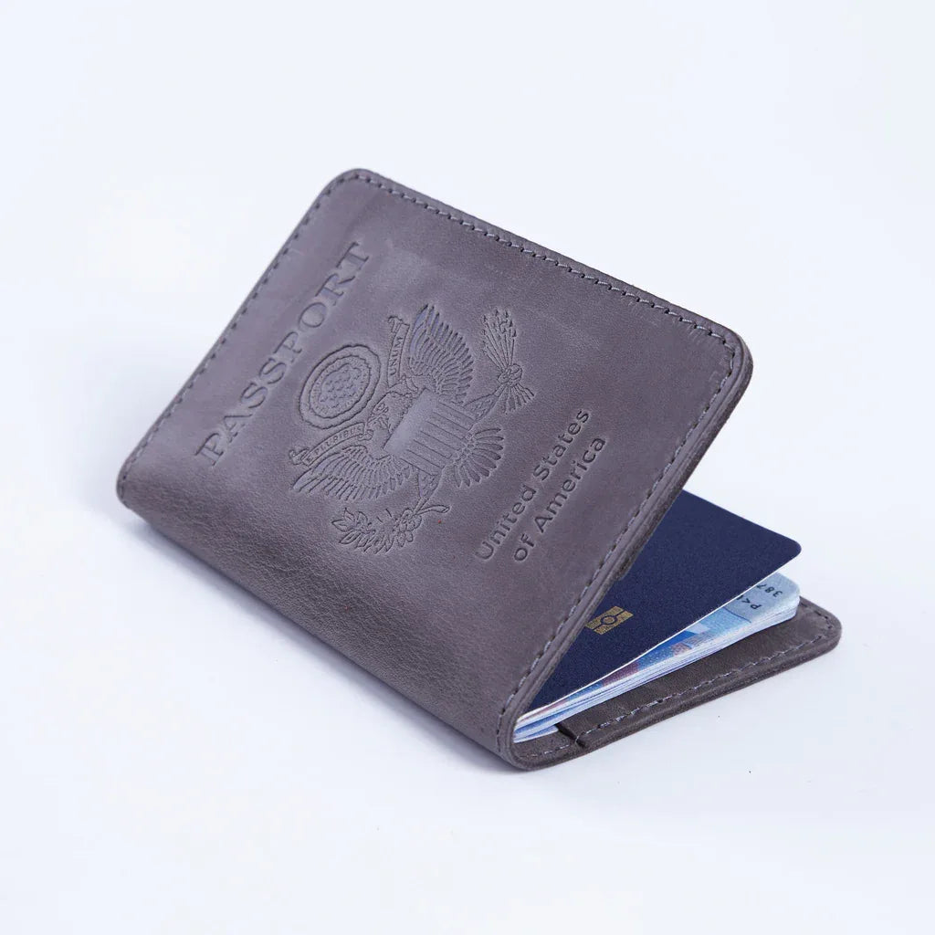 Interior view of INCARNE vintage leather passport holder showing two card slots and one cash pocket